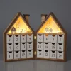 LED Adventskalender Holzhaus braun/weiss